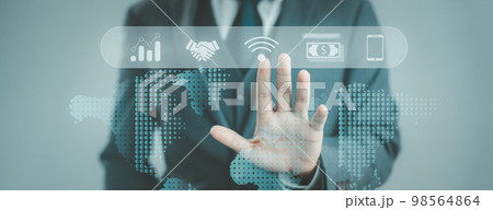 Businessman touching hologram virtual screen. connect to online data information. technology IoT, internet of things concept.. Businessman touching hologram virtual screen. connect to online data information. technology IoT, internet of things concept.. 98564864