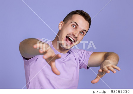 optimistic caucasian man pointing finger at you 98565356