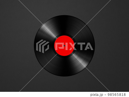 Red vinyl record isolated on black background Red vinyl record isolated on black background 98565818