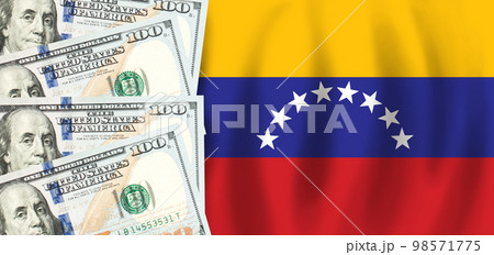 Dollars on flag of Venezuela, Venezuelan finance, subsidies, social support, GDP concept Dollars on flag of Venezuela, Venezuelan finance, subsidies, social support, GDP concept 98571775