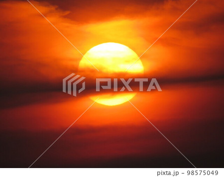 a sun at the sunset time, close up the sun a sun at the sunset time, close up the sun 98575049