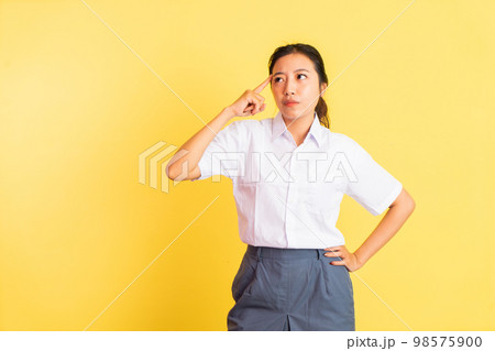 thinking expression of teenage girl in high school uniform thinking expression of teenage girl in high school uniform 98575900