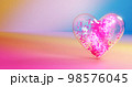 Magic of heart particles inside the glass heart jar and splashing particles 98576045