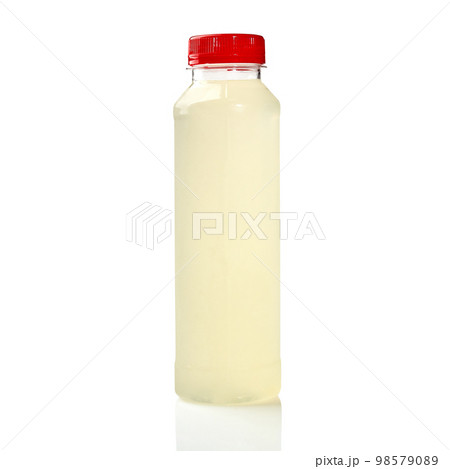 Plastic bottle of ginger lemonade on white background Plastic bottle of ginger lemonade on white background 98579089