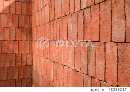brown brick wall textured, construction industry 98586237