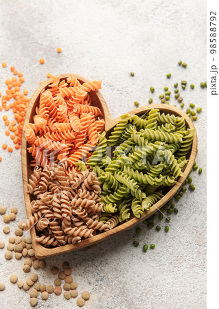 A variety of fusilli pasta from different types of legumes. Gluten-free pasta. 98588792