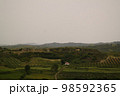 Landscape with the military bunkers in the middle of a rural fields, Apollonia, Fier, Albania 98592365