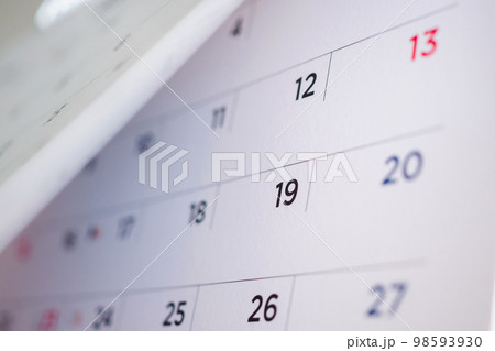 calendar page flipping sheet close up background 98593930