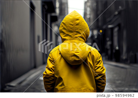 Kid in yellow jacket, view form behind, copy space Kid in yellow jacket, view form behind, copy space 98594962