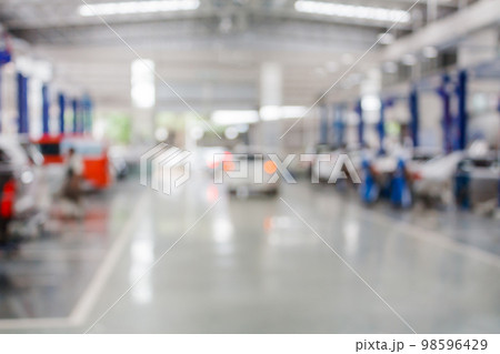 car service centre auto repair workshop blurred background car service centre auto repair workshop blurred background 98596429