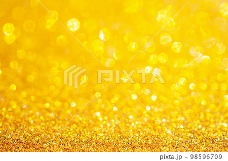gold glitter sparkle with bokeh background gold glitter sparkle with bokeh background 98596709