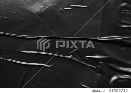black crumpled and creased plastic poster texture background black crumpled and creased plastic poster texture background 98596739