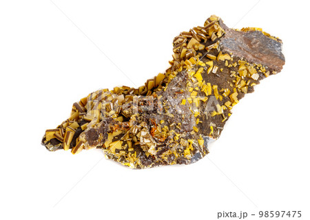 Macro mineral stone yellow Wulfenite on a white background Macro mineral stone yellow Wulfenite on a white background 98597475