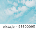 Abstract pastel blue sky with white cloud background. 98600095