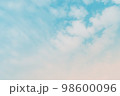 Abstract pastel blue sky with white cloud background. 98600096