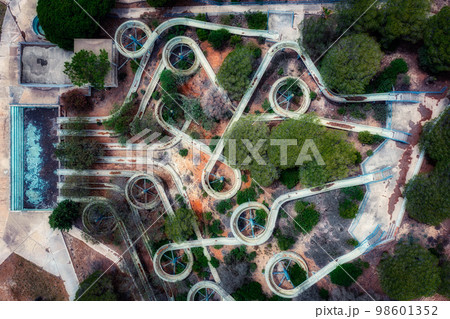 Aerial view of an abandoned old gloomy water park due to bankruptcy. Taken from a drone. Creative abstract 98601352