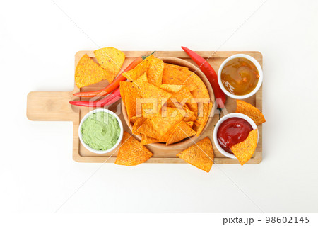 Concept of tasty snacks, corn chips, isolated on white background 98602145