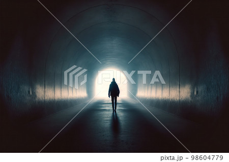Backlit silhouette of a man walking in a dark tunnel towards the light. Generative AI illustration with copy space Backlit silhouette of a man walking in a dark tunnel towards the light. Generative AI illustration with copy space 98604779