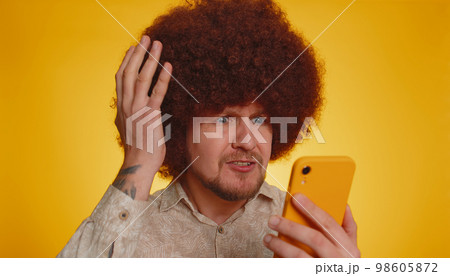 Man use smartphone typing browsing, loses becoming surprised sudden lottery results, bad fortune Man use smartphone typing browsing, loses becoming surprised sudden lottery results, bad fortune 98605872