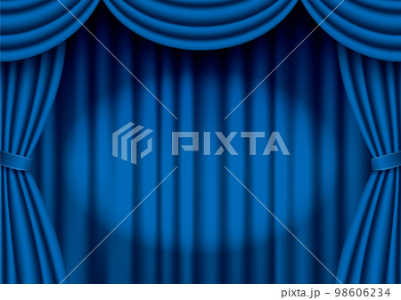 スポットライトが当たっている青色の緞帳 スポットライトが当たっている青色の緞帳 98606234