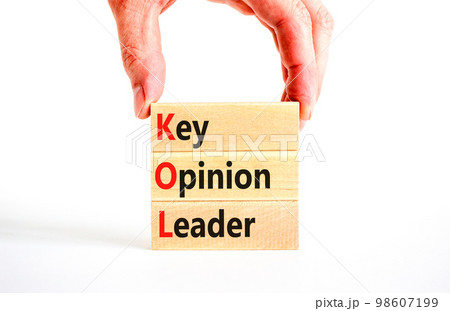 KOL key opinion leader symbol. Concept words KOL key opinion leader on wooden blocks on a beautiful white table white background. Businessman hand. Business KOL key opinion leader concept. Copy space. KOL key opinion leader symbol. Concept words KOL key opinion leader on wooden blocks on a beautiful white table white background. Businessman hand. Business KOL key opinion leader concept. Copy space. 98607199