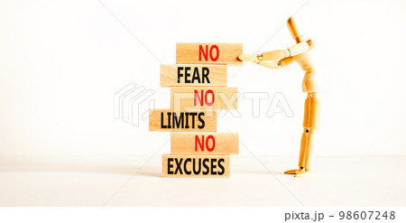 No fear limits excuses symbol. Concept words No fear no limits no excuses on wooden blocks. Beautiful white background. Businessman icon. Business not fear limits excuses concept. Copy space. 98607248