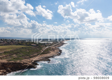 Mediterranean sea, white chalk rocks and some beaches captured from Rosh HaniKra formation in Israel. Mediterranean sea, white chalk rocks and some beaches captured from Rosh HaniKra formation in Israel. 98608609