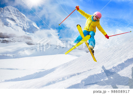 Kids ski. Winter family snow sport. Child skiing 98608917