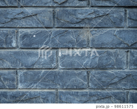 Old brickwork. Stone texture. Stone background. Gray blocks with cobwebs. Old brickwork. Stone texture. Stone background. Gray blocks with cobwebs. 98611575