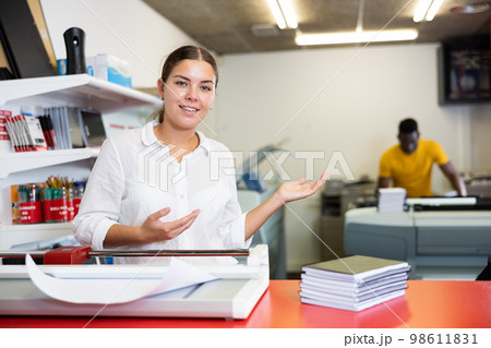 Friendly printing house worker invites you to visit office Friendly printing house worker invites you to visit office 98611831