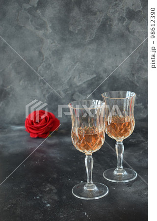 Valentine background with wine, roses and beautiful gift Valentine background with wine, roses and beautiful gift 98612390