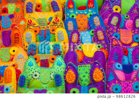 close-up many brooches animal head, sewn by hand, bright, colored, close-up many brooches animal head, sewn by hand, bright, colored, 98612826