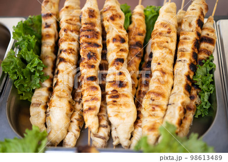 baked dough on the grill on a stick baked dough on the grill on a stick 98613489