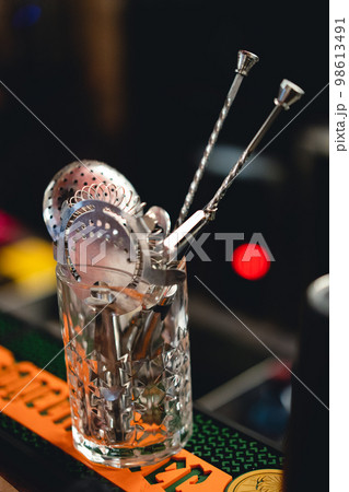 accessories of a bartender for preparation of an alcoholic cocktail. accessories of a bartender for preparation of an alcoholic cocktail. 98613491