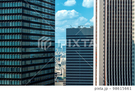 Skyscrapers above the cityscape of Shinjuku, Tokyo Skyscrapers above the cityscape of Shinjuku, Tokyo 98615661