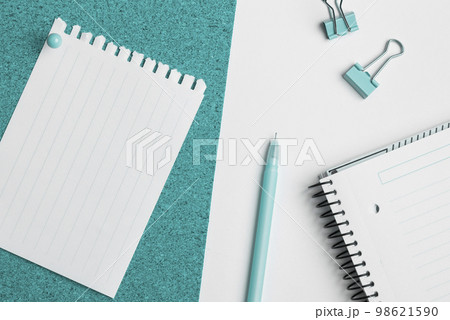 Photo With Pens Pencils Rullers Calculators. Notebook and Colored Paper Stickers Lying On White Desk. Multiple Assorted Collection Office Stationery. Postcards. Photo With Pens Pencils Rullers Calculators. Notebook and Colored Paper Stickers Lying On White Desk. Multiple Assorted Collection Office Stationery. Postcards. 98621590
