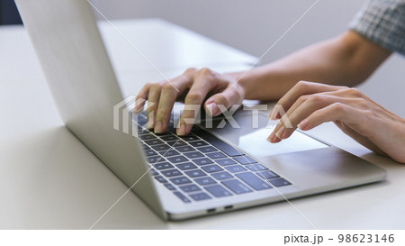 Woman hand using laptop or computor searching for information in internet online society web. Woman hand using laptop or computor searching for information in internet online society web. 98623146