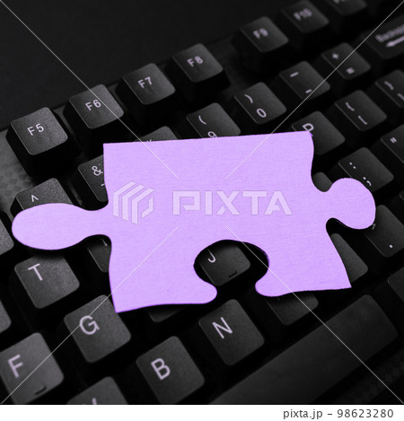 Colored sticker lying on black keyboard. Important information written over paper. Image with school supplies. Multiple Assorted Collection Office Stationery. Colored sticker lying on black keyboard. Important information written over paper. Image with school supplies. Multiple Assorted Collection Office Stationery. 98623280