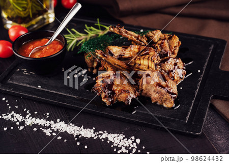 BBQ Grilled lamb chops steaks on board BBQ Grilled lamb chops steaks on board 98624432