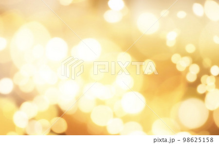きらきら輝く金色のボケ背景 きらきら輝く金色のボケ背景 98625158