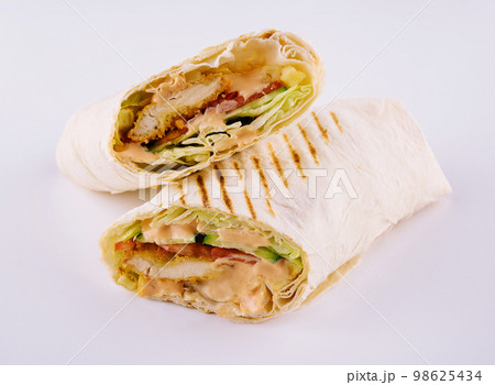 shawarma with chicken nuggets and vegetables 98625434