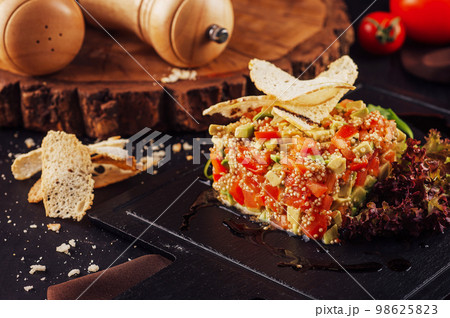 couscous tartare with avocado and tomato couscous tartare with avocado and tomato 98625823