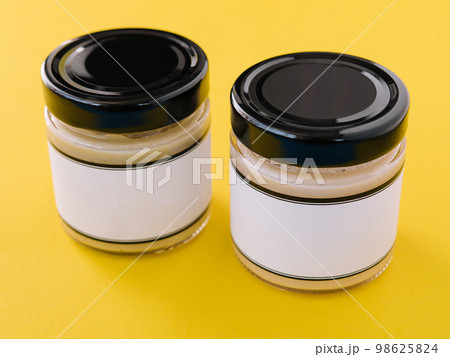 Variety of salad dressings in glass jars Variety of salad dressings in glass jars 98625824