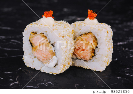 Tempura Maki Sushi with fried salmon inside Tempura Maki Sushi with fried salmon inside 98625856