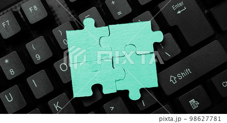 Colored sticker lying on black keyboard. Important information written over paper. Image with school supplies. Multiple Assorted Collection Office Stationery. 98627781