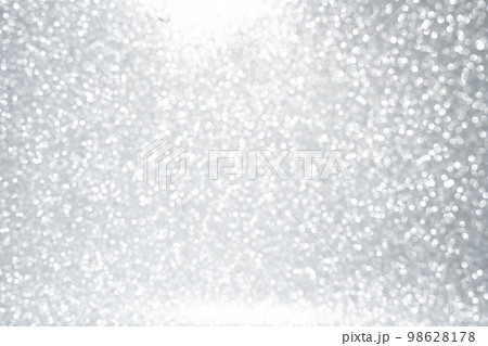 Silver abstract shiny background. Blurred background texture. Silver abstract shiny background. Blurred background texture. 98628178
