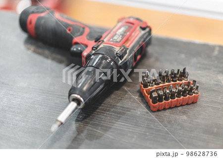 two electric screwdrivers or drills for screwing and drilling 98628736