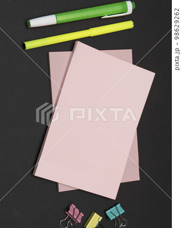 Different Office Supplies, Colored Stickers, Notebooks. Pens, Pencils, Rullers, Marckers. Different School Items. Important information. Accessories lying on desk. 98629262