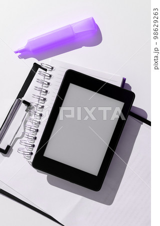 Tablet Screen With Important Ideas On It And Note Sticked On It On Desk With Notebook And Marker. Cellphone With Crutial Informations And Memo Attached To It. 98629263