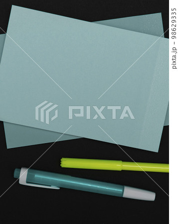 Photo With Pens Pencils Rullers Calculators. Notebook and Colored Paper Stickers Lying On White Desk. Multiple Assorted Collection Office Stationery. Postcards. Photo With Pens Pencils Rullers Calculators. Notebook and Colored Paper Stickers Lying On White Desk. Multiple Assorted Collection Office Stationery. Postcards. 98629335